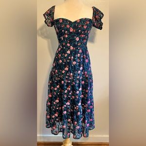 Dress the Population black mesh/embroidered flowers dress. 4.5” W adj. sleeves.